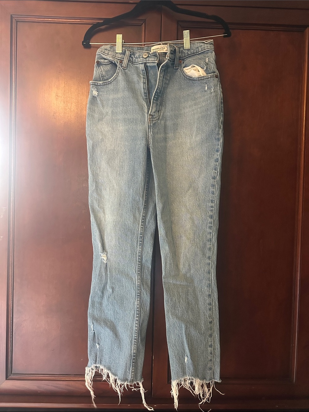 Ultra High-Rise Kick Flare Light Blue Jeans with Distressed Hem